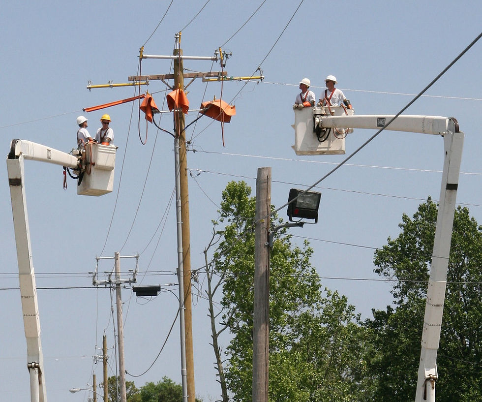 workers working on telephone poles
