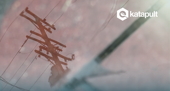 Telephone pole reflected in brick water. 