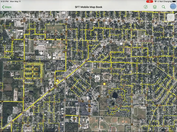 GIS export with aerial view of map and yellow grid lines. 