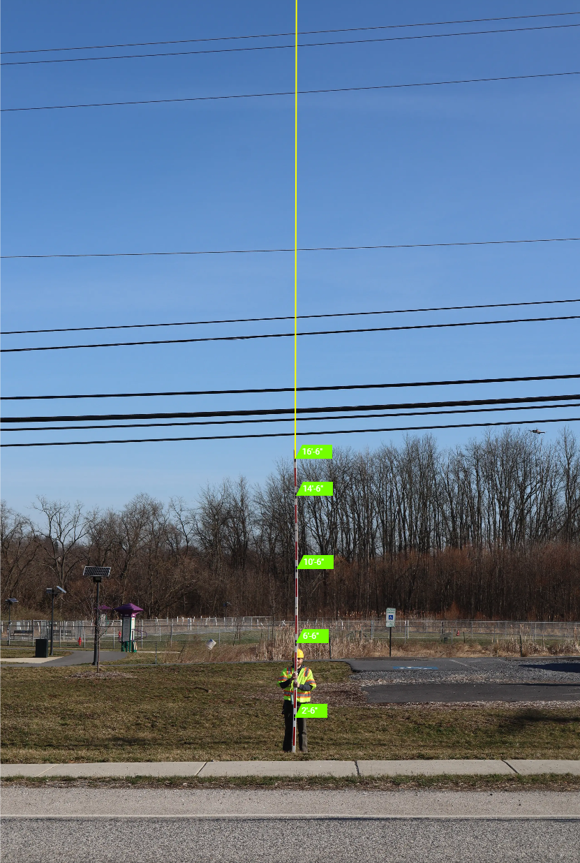 Height stick used to gather midspan photos for PCI collection 