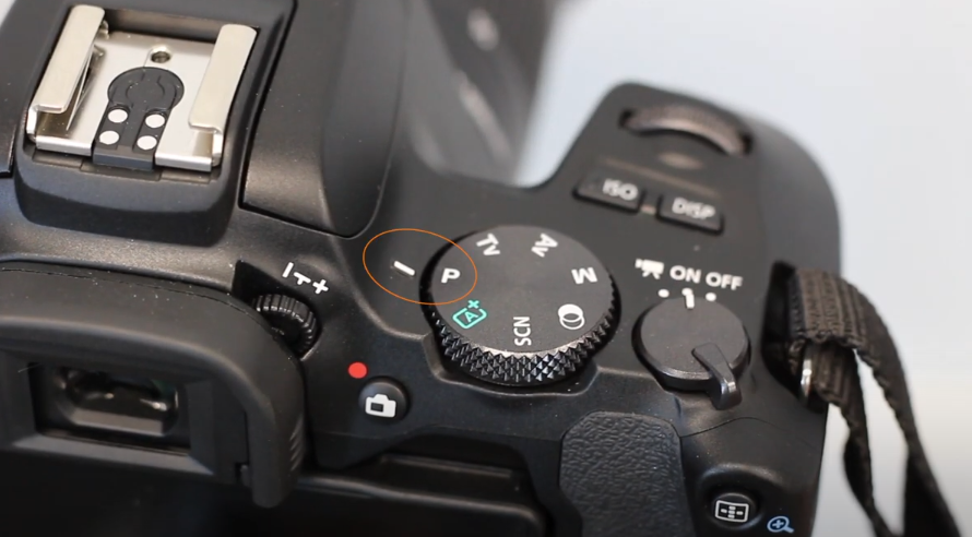 putting the camera into program mode